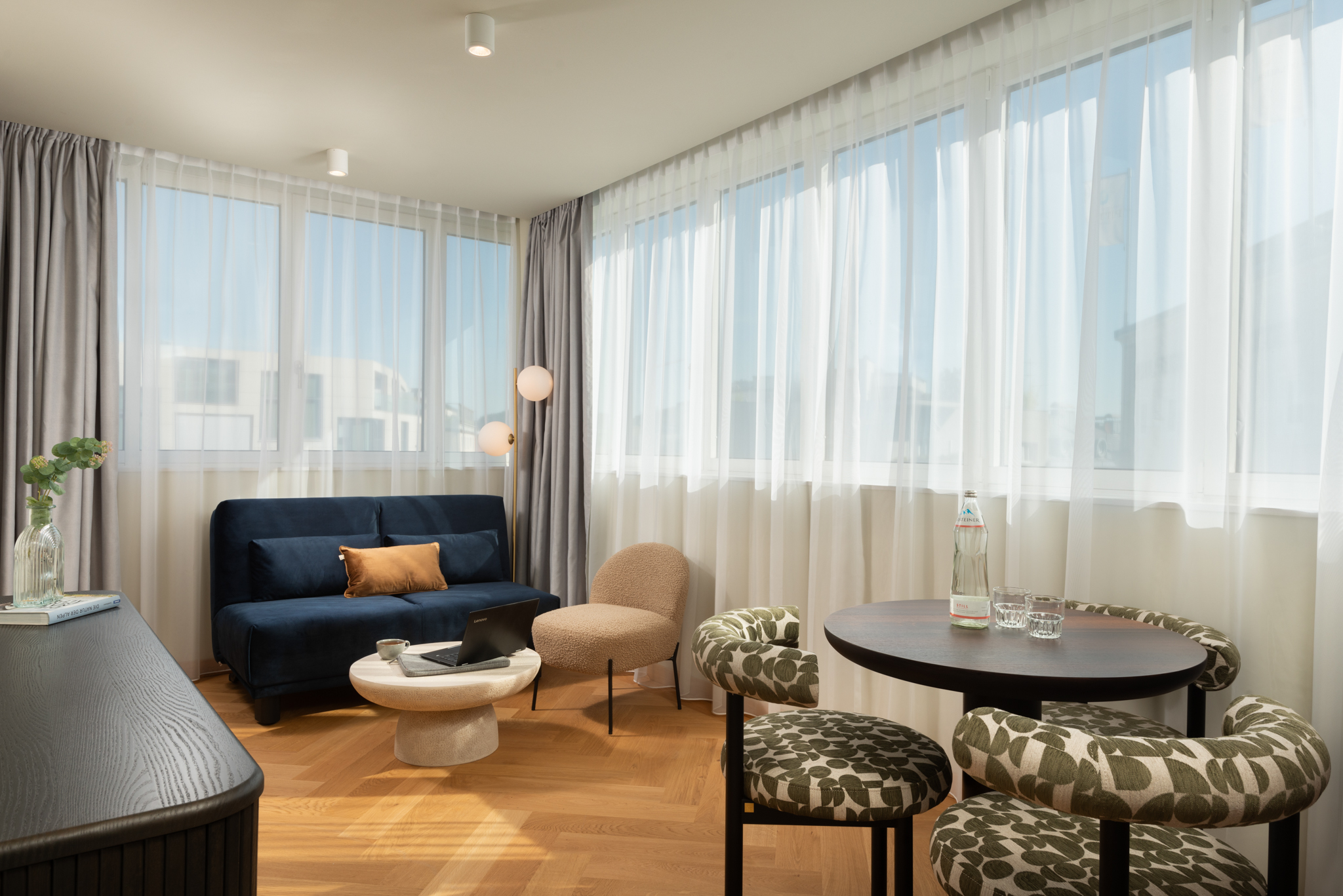 Deluxe one-bedroom at master Mirabell featuring a cozy double sofa 