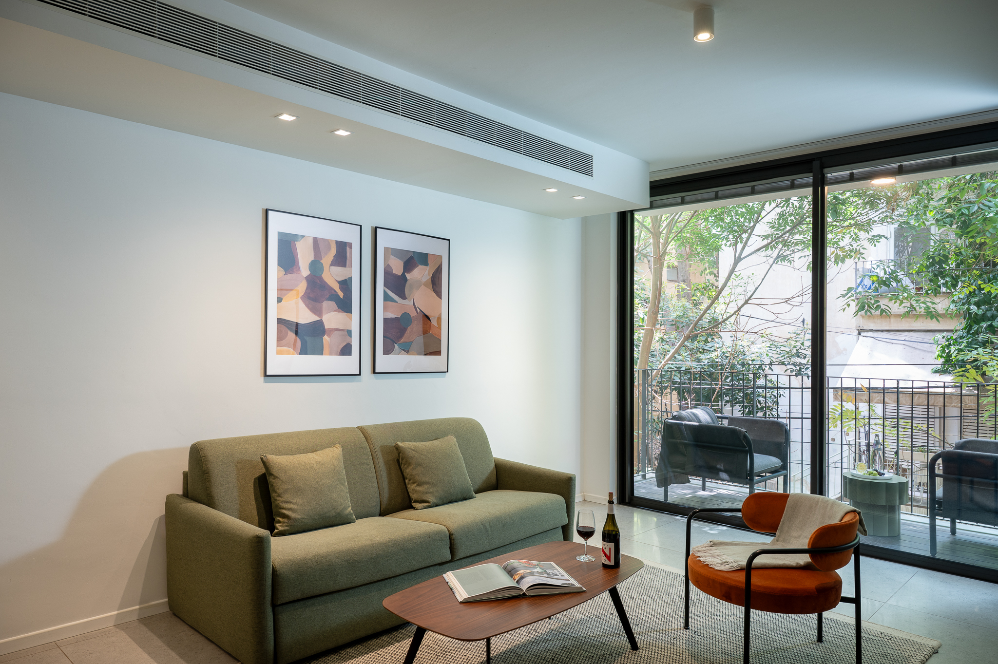 One Bedroom Apartment With Balcony - Living Area and Balcony