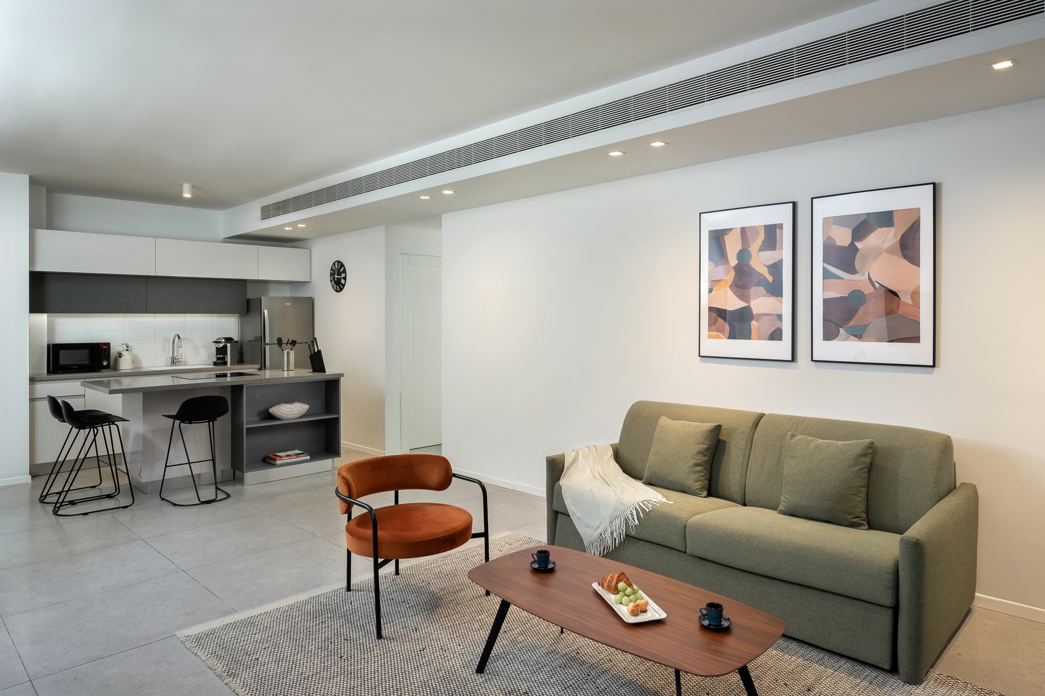 One Bedroom Apartment With Balcony - Living Area and Kitchen